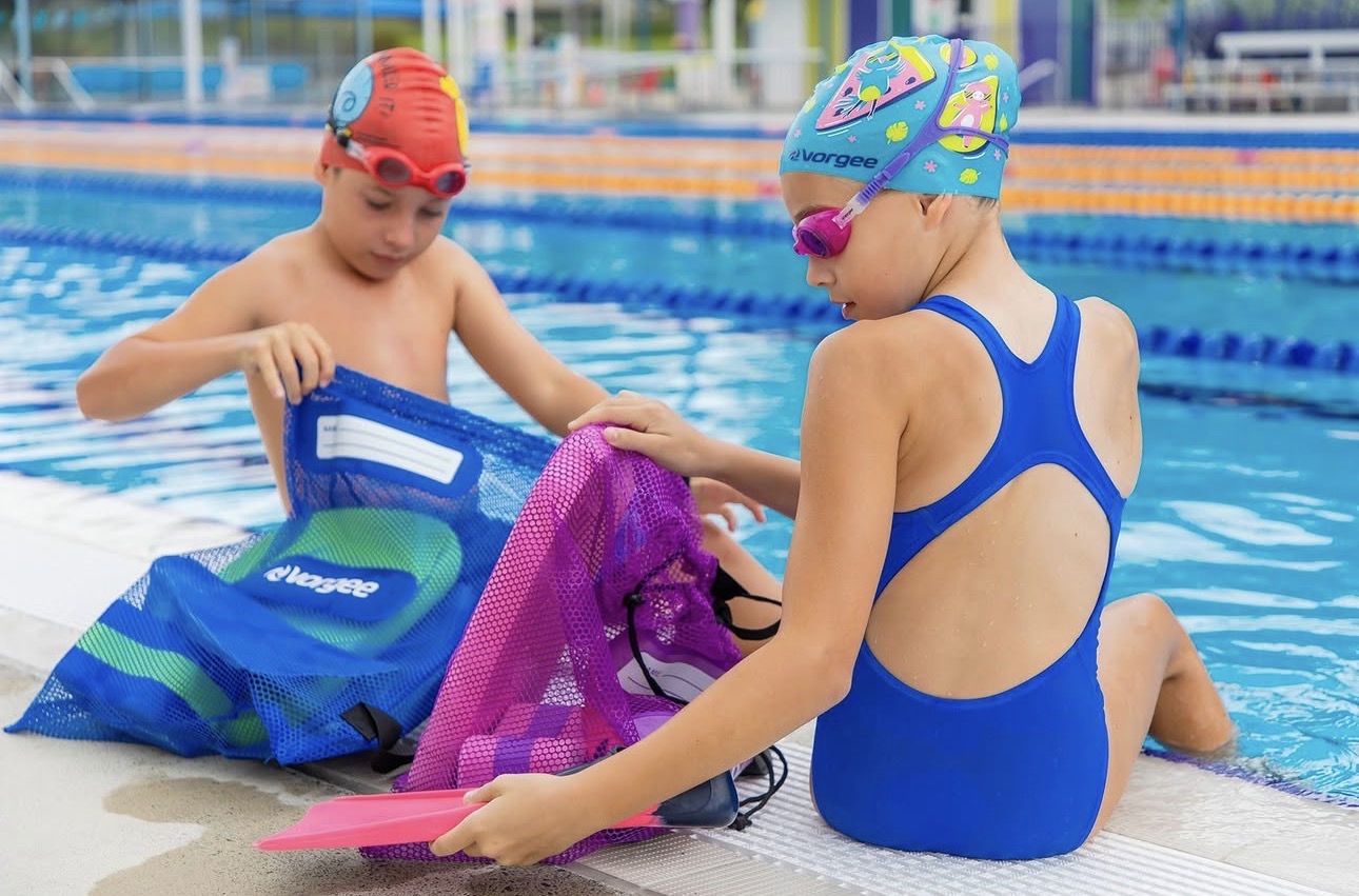 Swim mesh gear bags for quick-drying poolside storage at Swimwear Shack