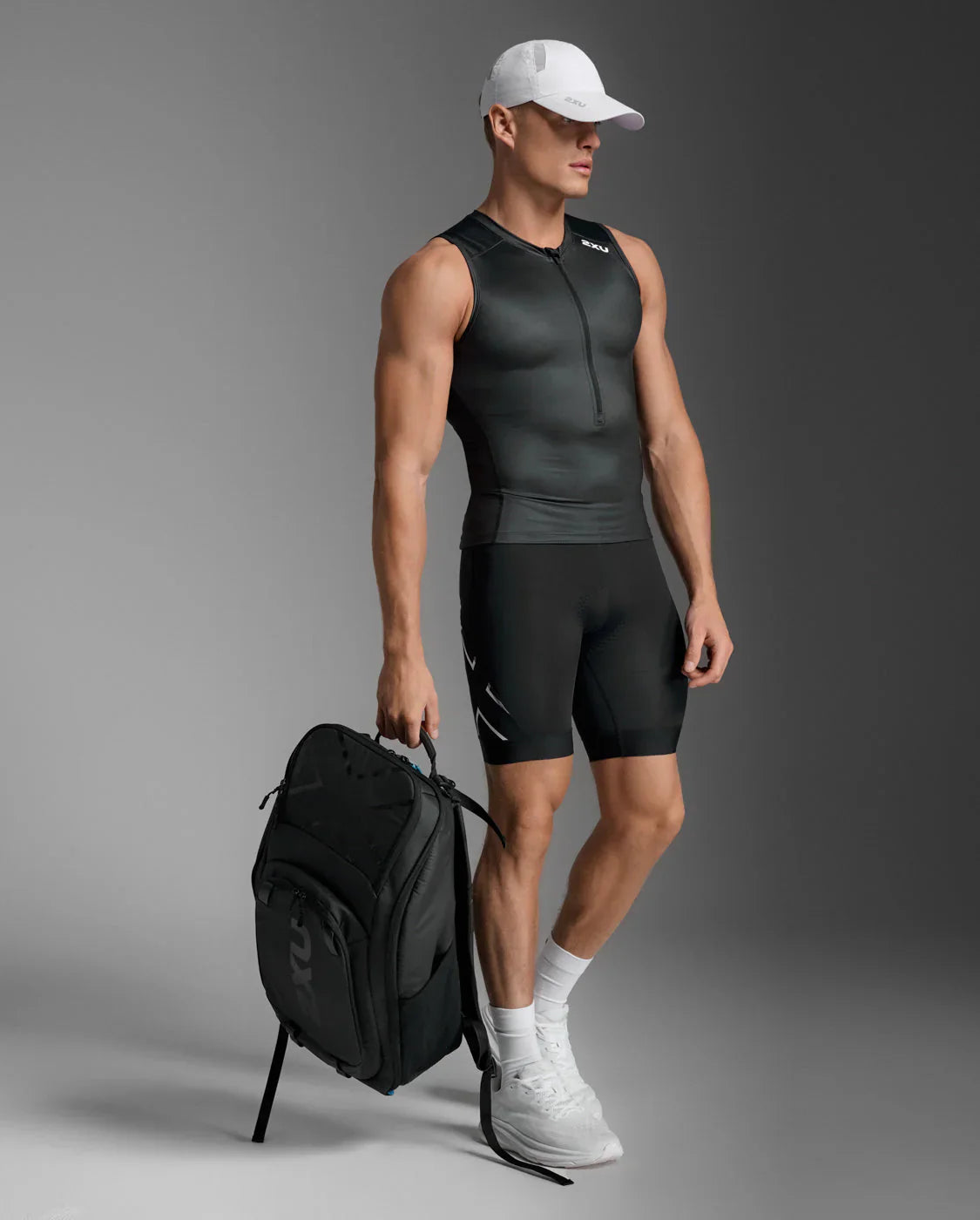 tri suits at Swimwear Shack. 2XU sleeved and sleeveless trisuits and swimskins built for swim-bike-run performance