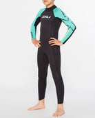 Person wearing a black and teal wetsuit with 2XU branding on a white background